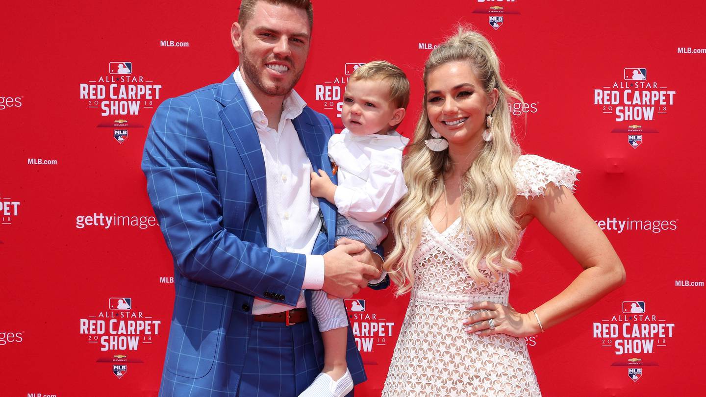 Atlanta Braves All-Star Freddie Freeman is presented his All-Star jersey by  his wife, Chelsea, and son Charlie before the Braves played the Toronto  Blue Jays in a baseball game Tuesday, July 10