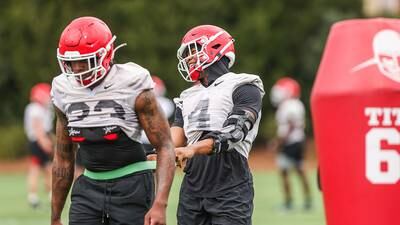 Dogs, in defense of national championship, open football practice today