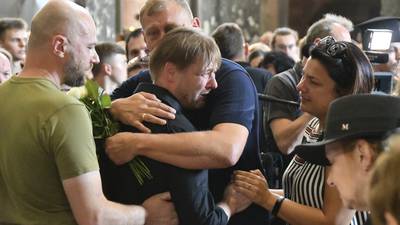 In Ukraine, a city grieves for a family killed in a deadly Russia missile attack