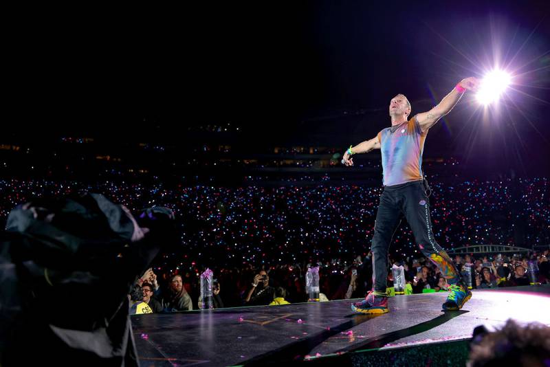 PASADENA, CALIFORNIA - SEPTEMBER 30: Chris Martin of Coldplay performs onstage at Rose Bowl Stadium on September 30, 2023 in Pasadena, California. (Photo by Monica Schipper/Getty Images)