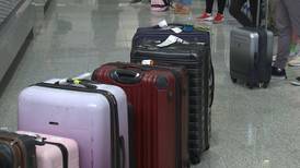 Experts say unless you have to check a bag for your flight, don’t