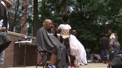 Junior barbers cut hair free of charge for homeless people