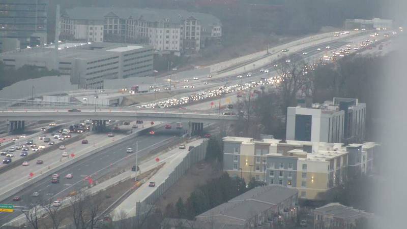 This picture shows many drivers who missed newly relocated I-285 ramps stacking up in the remaining GA-400/southbound lanes in Sandy Springs.