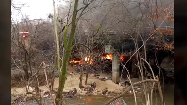 Homeless camp uncovered after another bridge fire in Northeast Atlanta