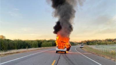 Car engulfed in flames after hitting deer
