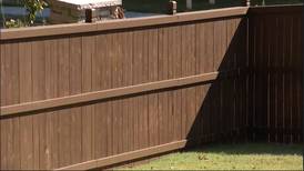 Metro homeowner in fight over privacy fence after getting permission from homebuilder, she says