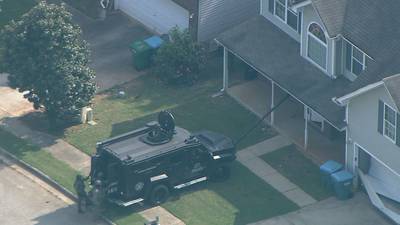 DEVELOPING: SWAT teams investigating home in Hampton