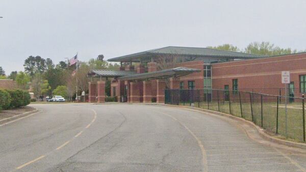 Two teens caught with firearms, drugs in Hall County school parking lot