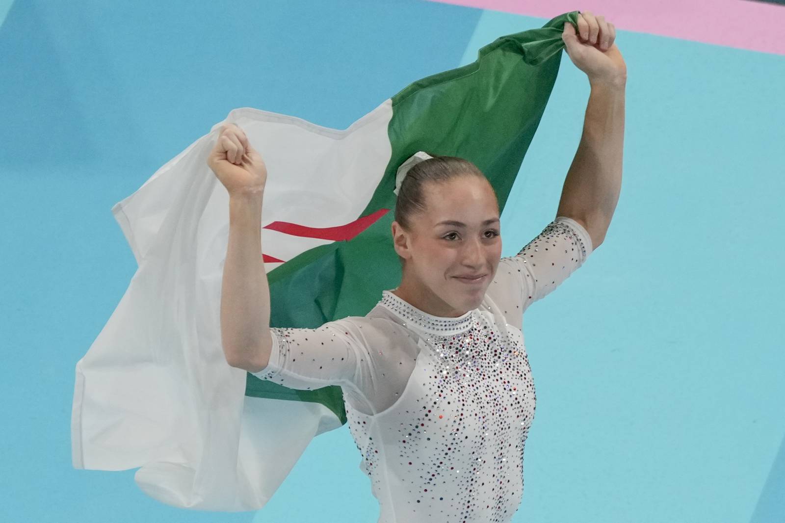 Kaylia Nemour of Algeria wins the gold in uneven bars and Suni Lee