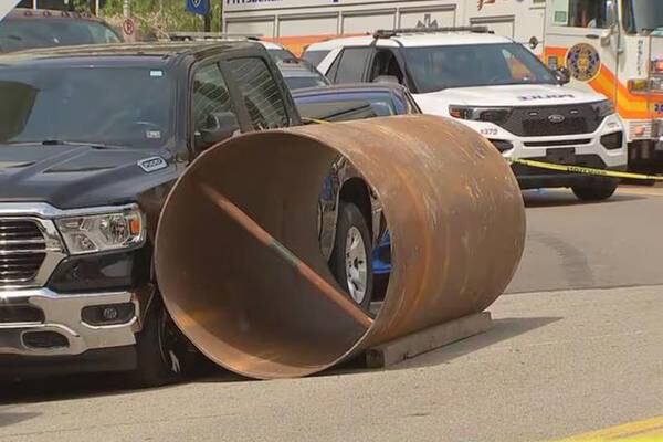 1-ton steel cylinder from construction site, rolls down hill, hits woman