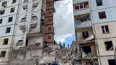 An apartment block collapses in a Russian border city after heavy shelling, injuring over a dozen