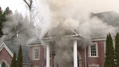 Family escapes after basement fire spreads through Buckhead mansion
