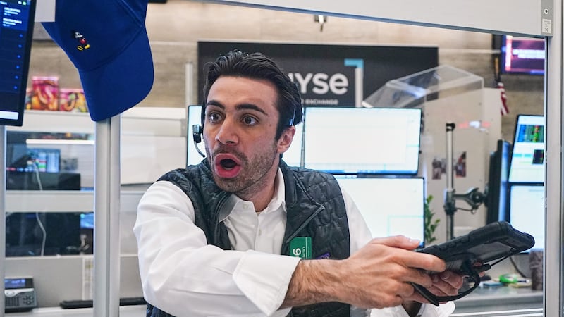 Stocks waver on Wall Street while crude oil prices fall for the first time in a week