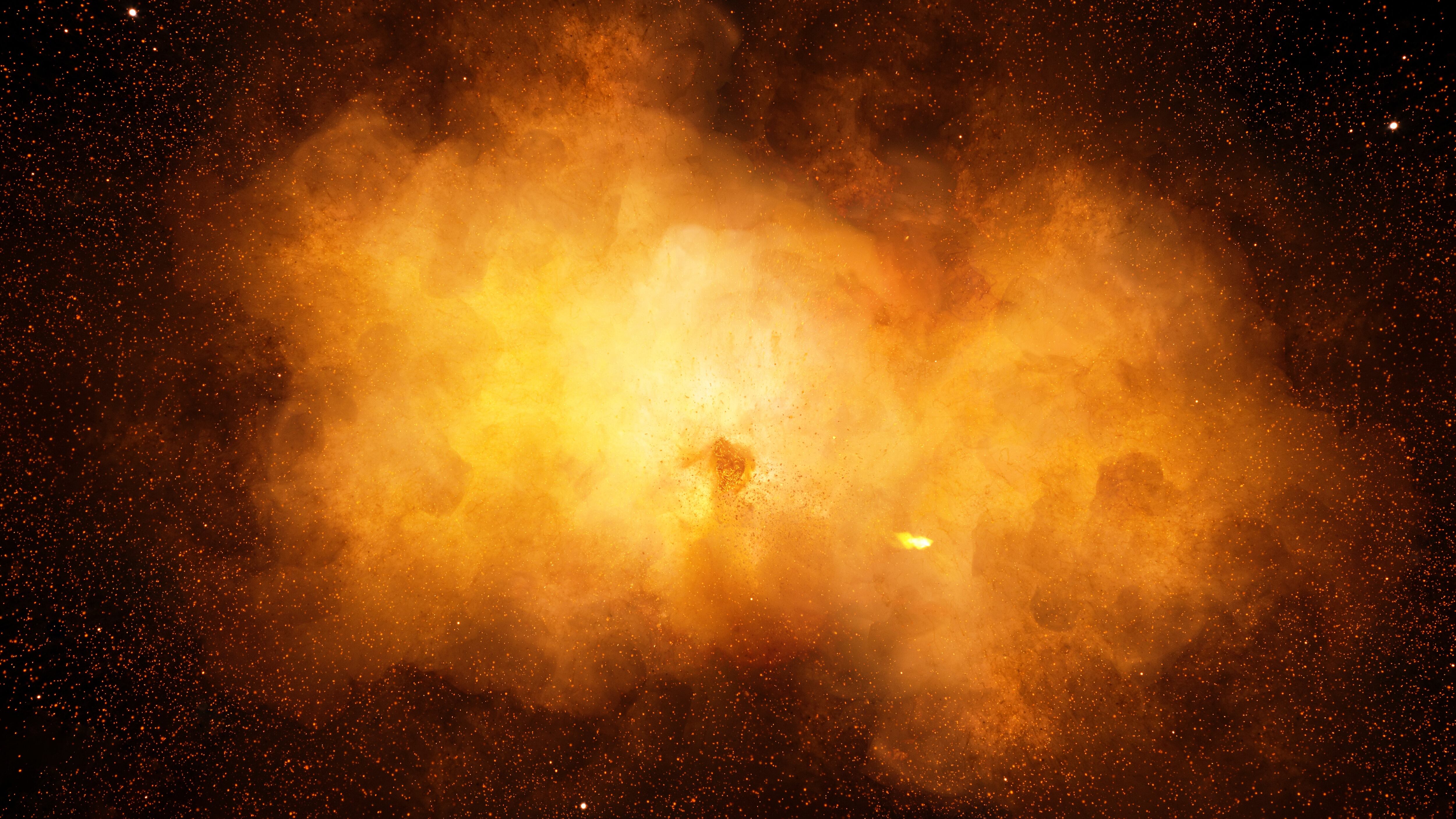 Huge, extremely hot explosion with sparks and hot smoke, against black background