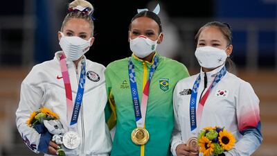 From left, MyKayla Skinner of the United States, Rebeca Andrade of Brazil and Yeo Seo-jeong of South Korea, pose with their medals for the vault during the artistic gymnastics women's apparatus final at the 2020 Summer Olympics, Sunday, Aug. 1, 2021, in Tokyo, Japan.