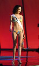 2004: Miss Israel Gal Gadot walks on the stage in a swimsuit during the first official presentation with the panel of Miss Universe judges in Quito, Ecuador, on May 27, 2004.