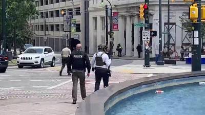 Multiple law enforcement agencies swarm downtown Atlanta after car crashes into light pole